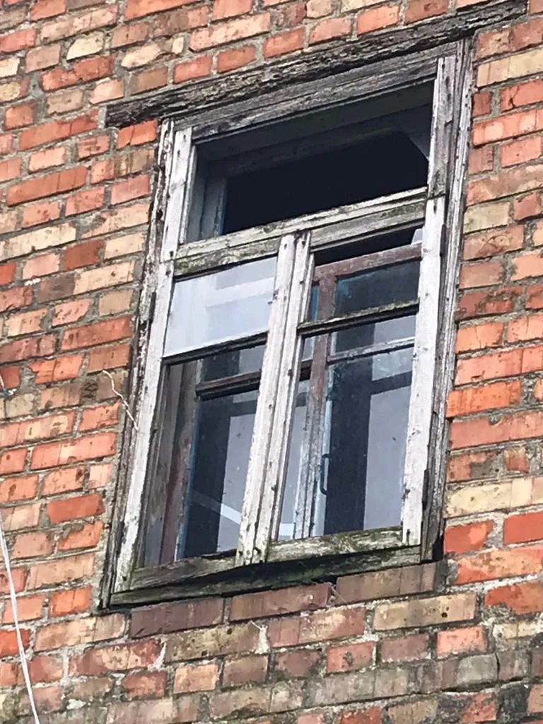 A damaged window awaiting repair in Ukraine