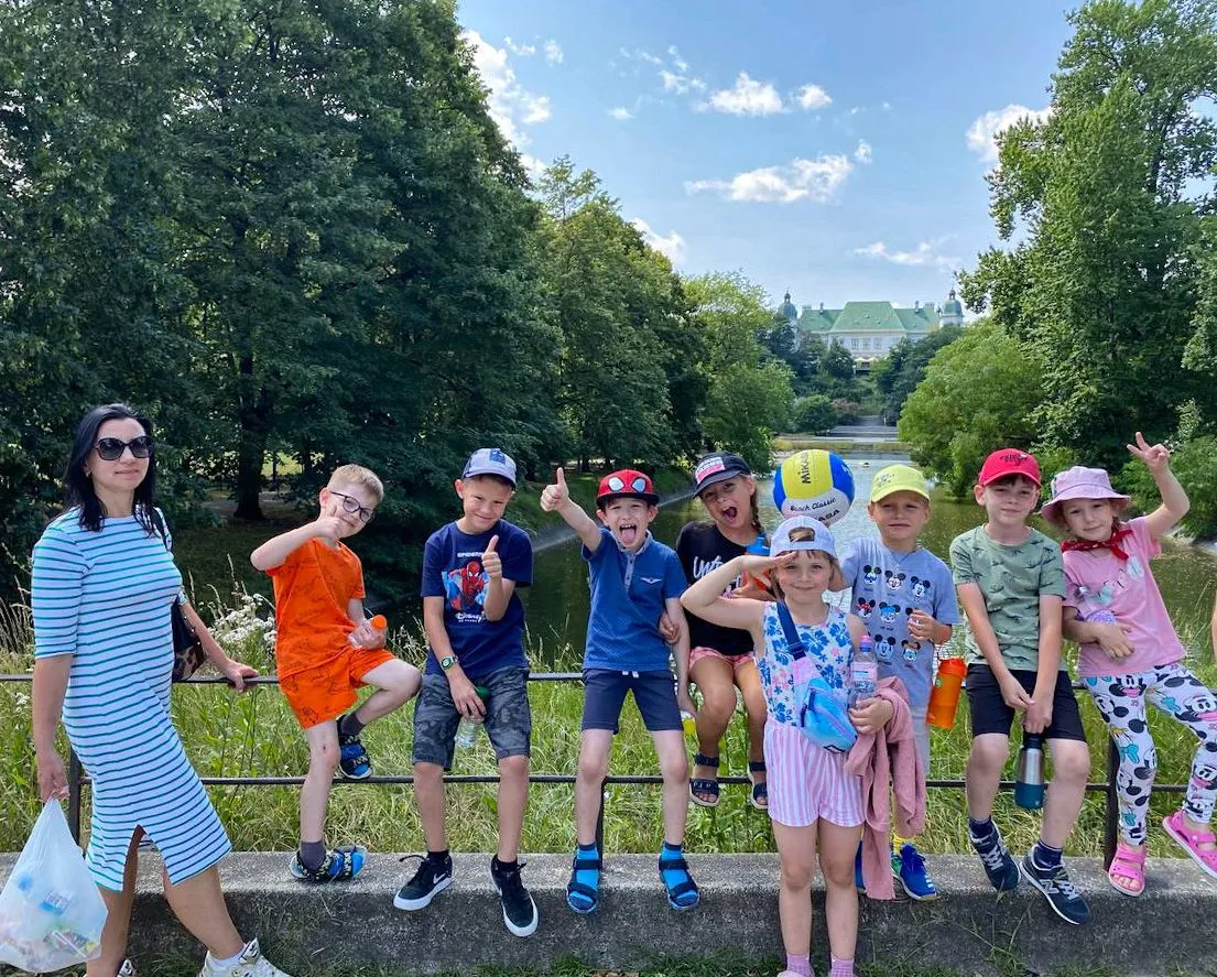 Children and a counselor enjoying a Sunflower Camp outing