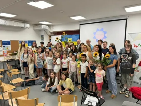 Ukrainian children and supporters gathered at the summer camp